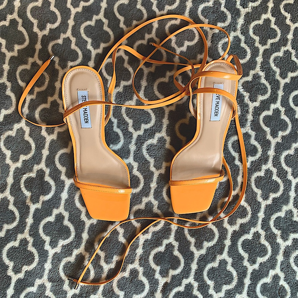 Wrapped stiletto open square box cushioned toe heel sandals.